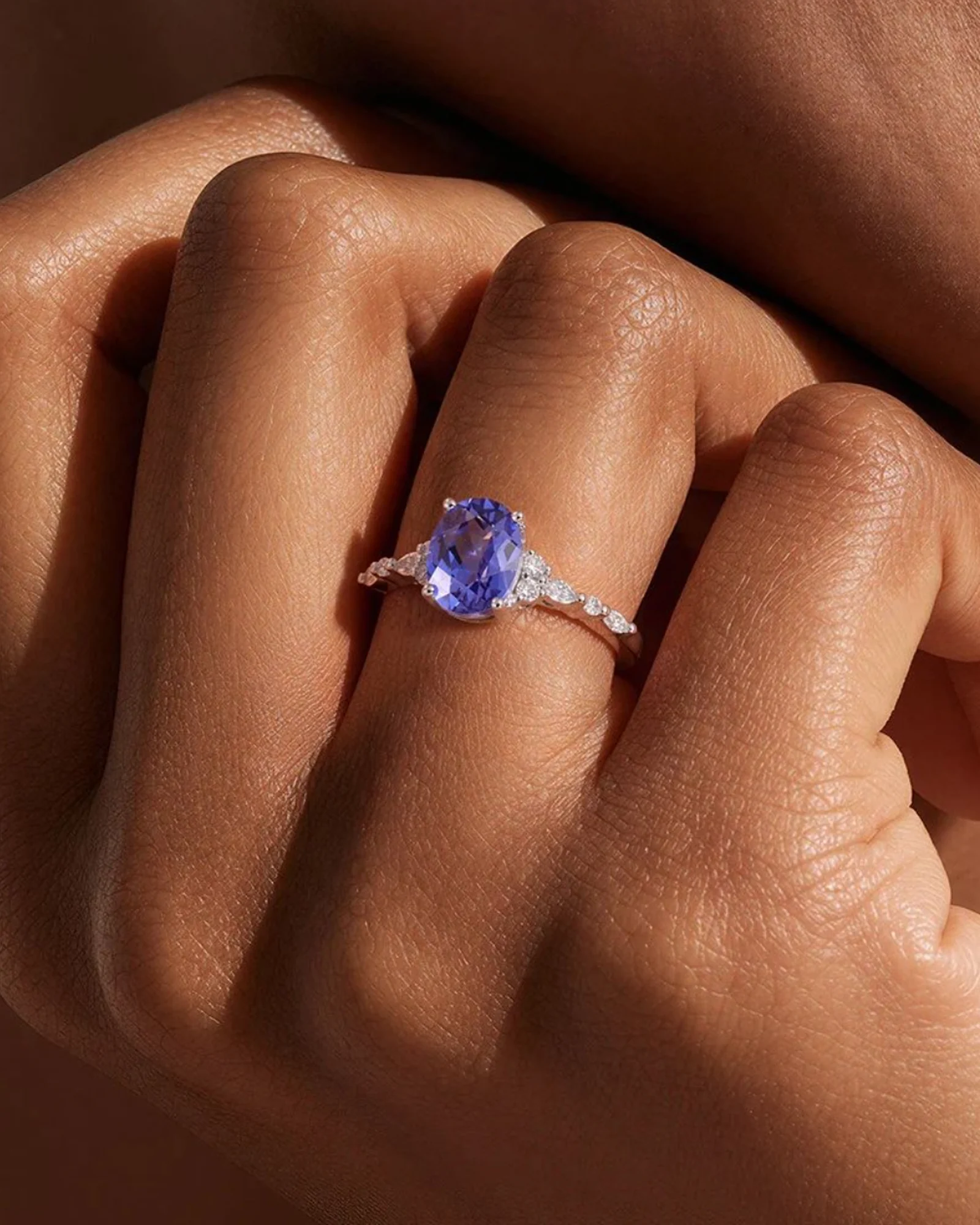 Violet Ceylon sapphire solitaire worn on the hand