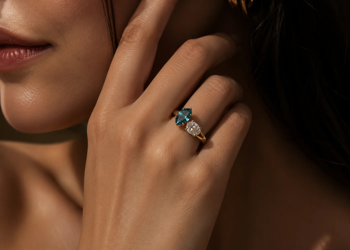 Teal Ceylon sapphire toi et moi ring worn on the hand