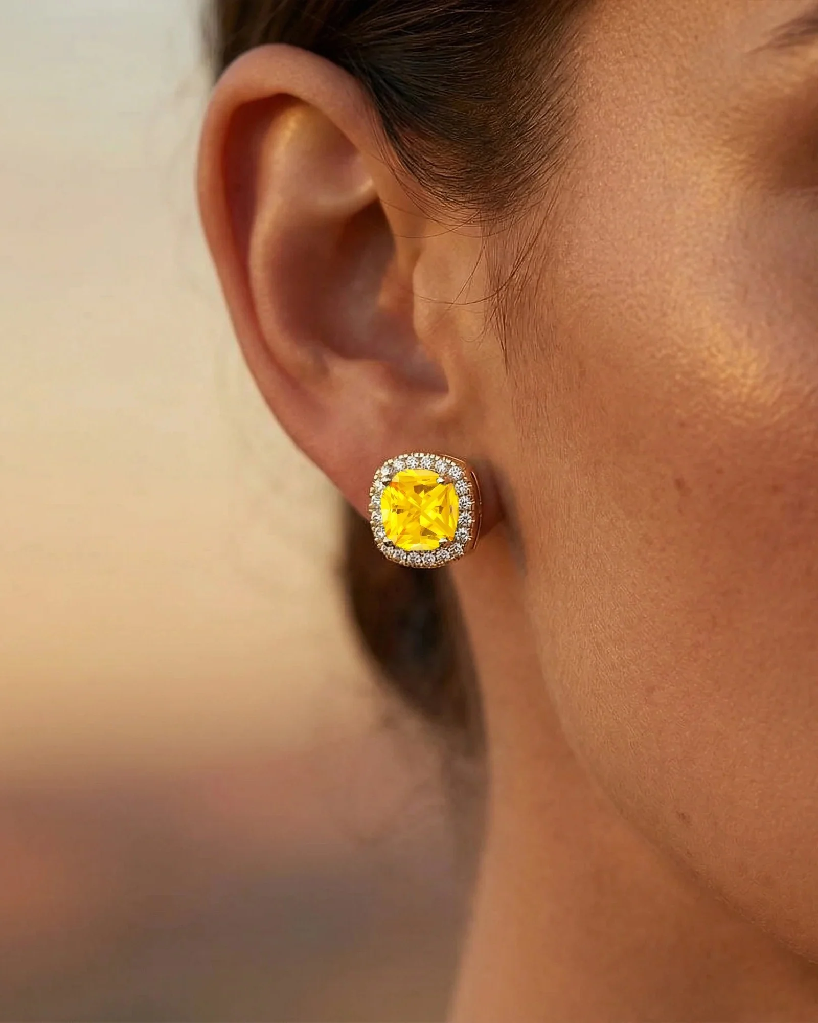 Yellow Ceylon sapphire halo stud worn